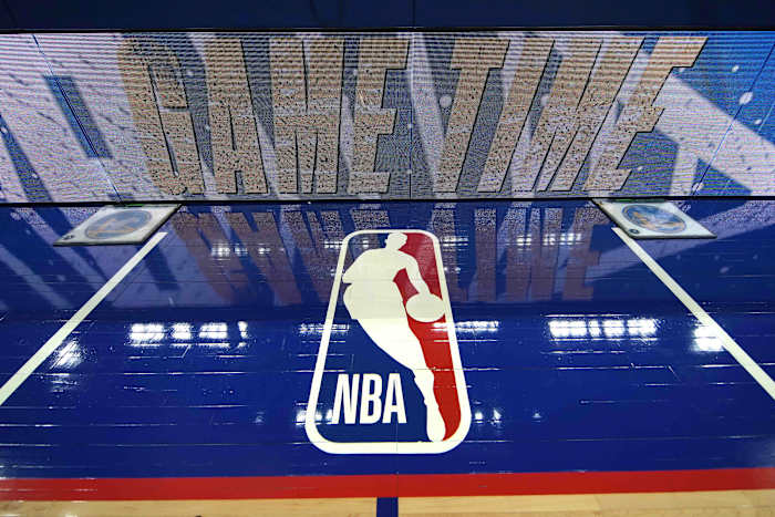 Mar 12, 2022; San Francisco, California, USA; A view of the NBA logo painted on the sideline before the game between the Golden State Warriors and the Milwaukee Bucks at Chase Center.